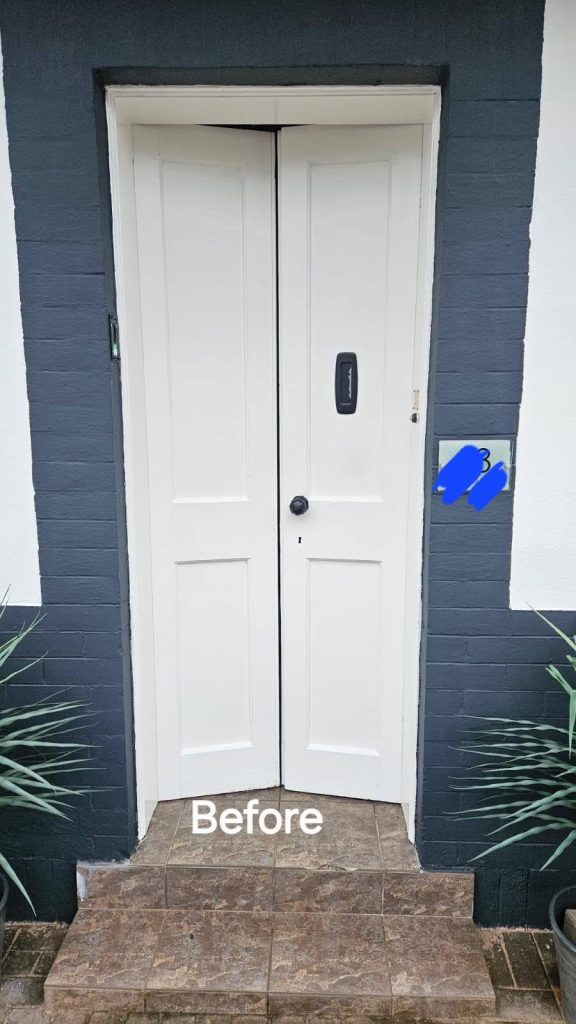 Before: the old white panelled double doors that the French doors replaced