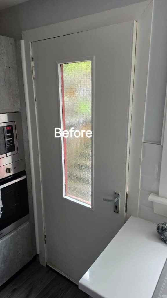 Before: the old white kitchen back door with a narrow glass panel
