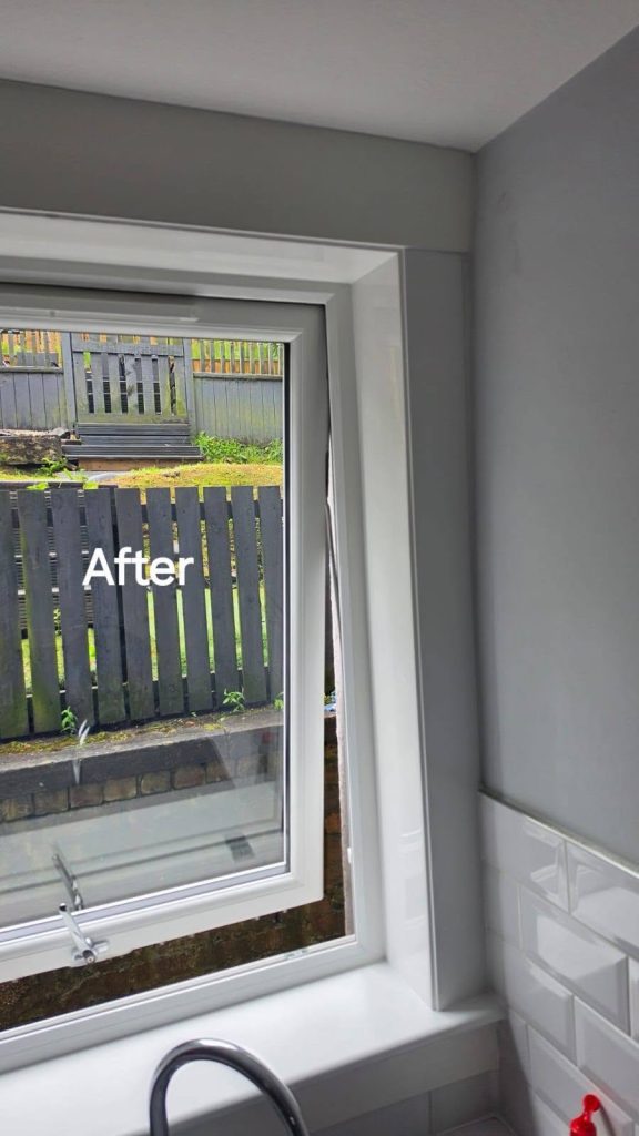 After: side view of the new white uPVC kitchen window and tiled surround